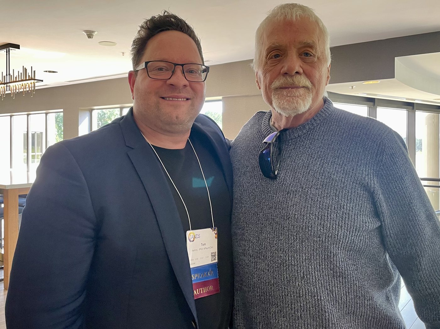 Tom Nehmy with Dr Allan Botkin, creator of IADC therapy, at IANDS 2025 in Chicago